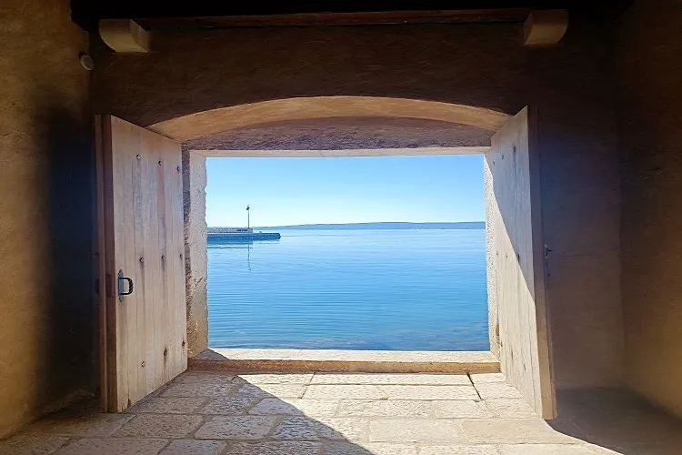 image of door and sea